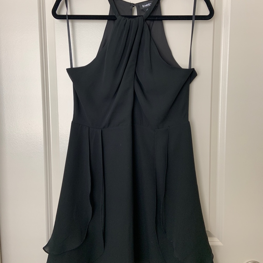 Black halter neck dress with chest keyhole